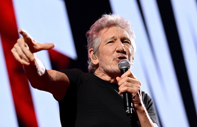 A man speaks into a microphone