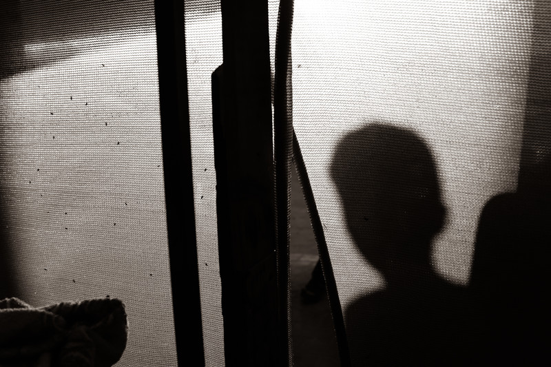 A boy in silhouette