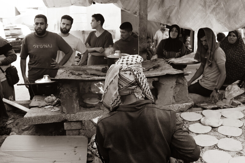 People line up for bread