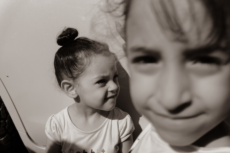 Two girls pose for the camera