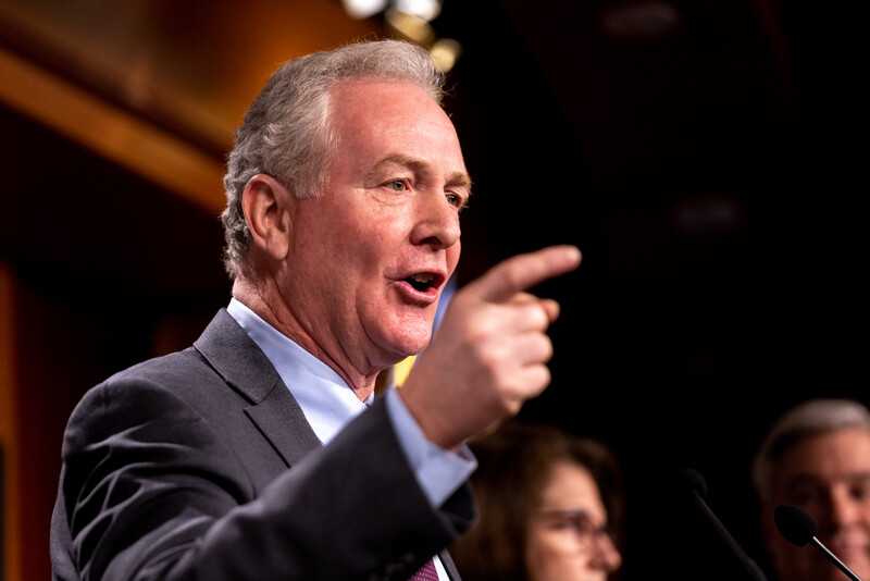 Senator Chris Van Hollen gesticulates