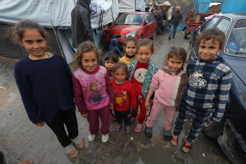 A group of children pose for the camera