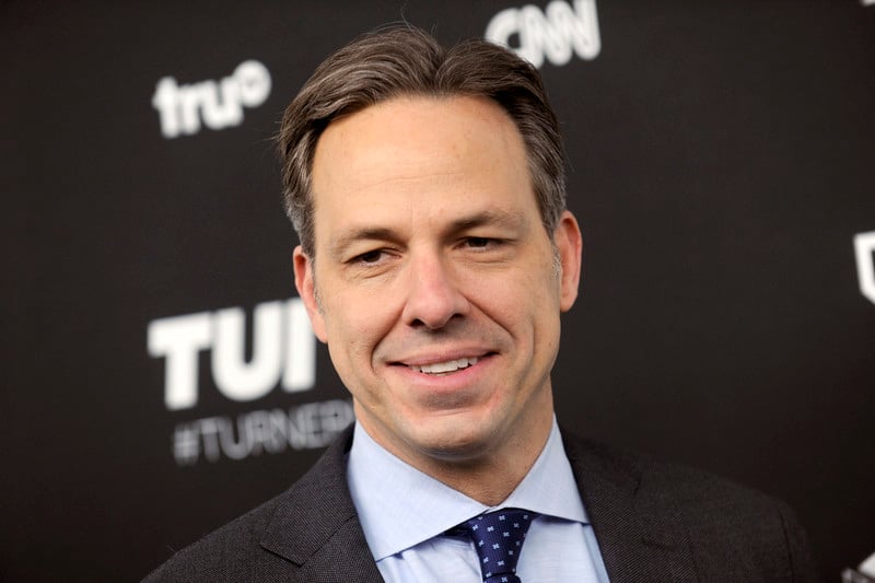 Jake Tapper grins during an event at Madison Square Garden in New York City