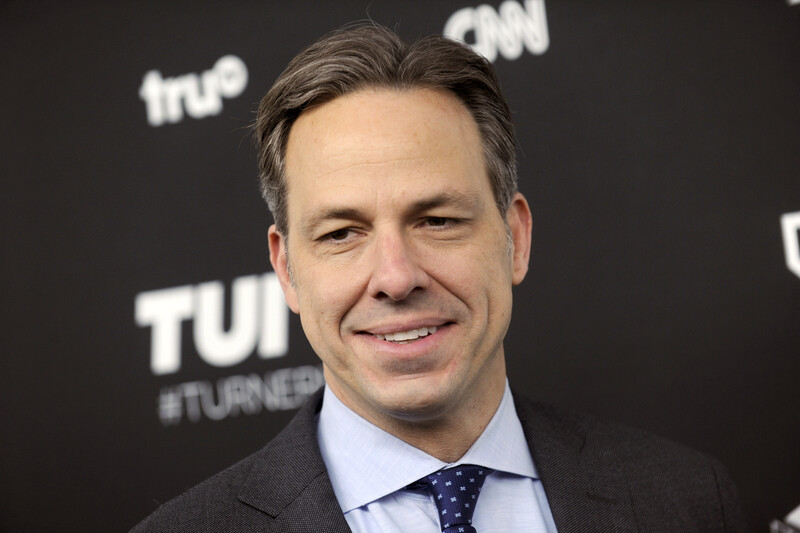 Jake Tapper grins during an event at Madison Square Garden in New York City