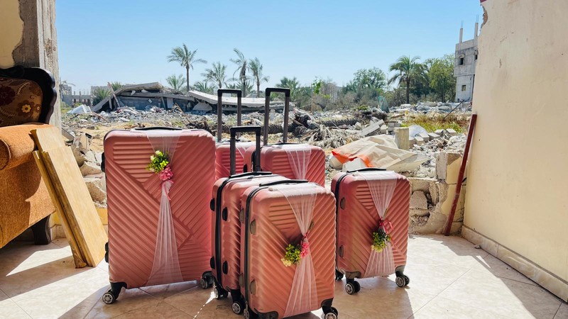 Four pink suitcases
