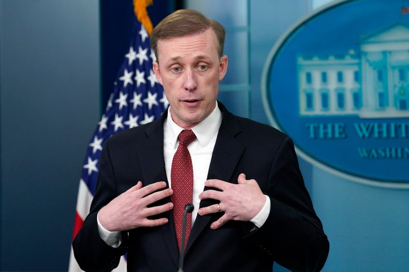 A man gestures during a press conference