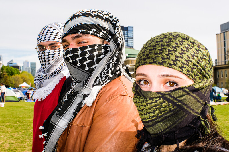 Three students at the encampment