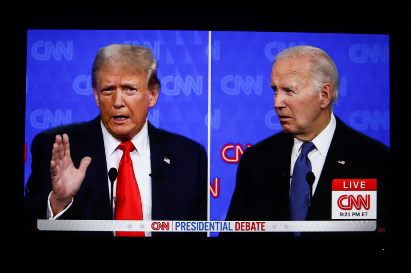 Presidential debate photo of a split screen with Donald Trump on left and Joe Biden on right