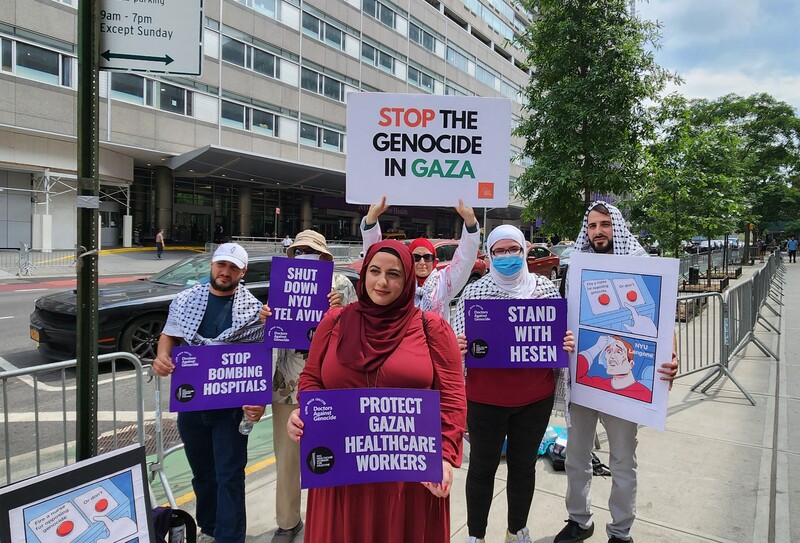 a group of demonstrators protest in New York