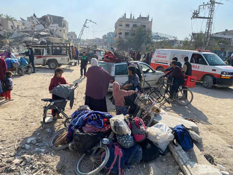 people try to bring their belongings with them as they are forced to flee northern Gaza