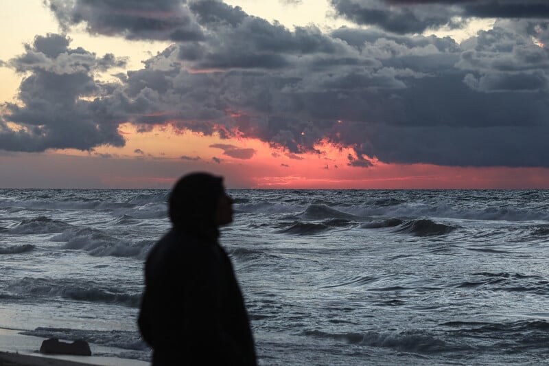 The sun sets on over the sea off Gaza