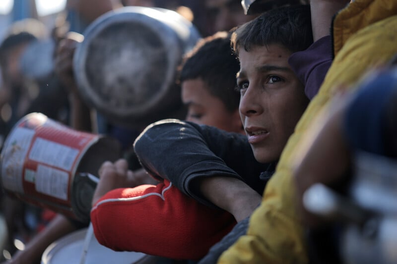 children wait with pots