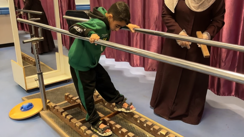 A boy gets physio