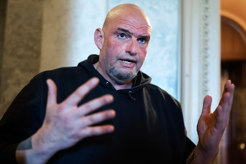 Senator John Fetterman gesticulates in the US Capitol Building