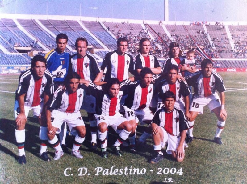 A boy sits with soccer team