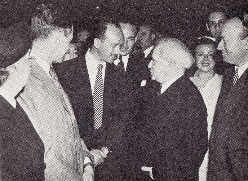 A group of people mingling at a reception