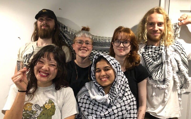 Six activists pose for the camera