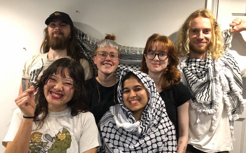 Six activists pose for the camera