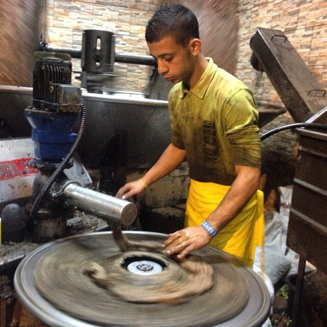 One more from last night: lining up the olive paste in these moving rods which are then stacked over each other and pressed to squeeze out the olive oil. Still in concentrated form before it is further refined. Making olive oil is a dirty process and so little comes out of so much, but the end result is liquid gold. It has a lesson in it. #beitJala #palestine One more from last night: lining up the olive paste in these moving rods which are then stacked over each other and pressed to squeeze out the olive oil. Still in concentrated form before it is further refined. Making olive oil is a dirty process and so little comes out of so much, but the end result is liquid gold. It has a lesson in it. #beitJala #palestine on Instagram
