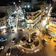 Nighttime aerial view of roundabout at Ramallah's city center