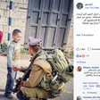 Screenshot of COGAT Facebook post of photograph of kneeling Israeli soldier carrying rifle shaking the hand of a young Palestinian boy as a girl stands nearby
