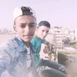 Selfie photo of boys sitting on a rooftop