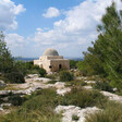 A lone Palestinian house stands amidst the ruins of villages demolished by Israel to make Canada Park.