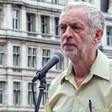 A man speaks into a microphone