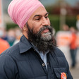 A close-up photo of Jagmeet Singh, seen from chest up, at a rally