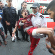 Paramedic carries wounded boy