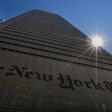 Sun shines behind New York Times building