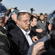 Close up of Itamar Ben-Gvir surrounded by people