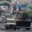 An Israeli military bulldozer and jeep in Jenin refugee camp