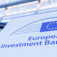 A large blue and white sign bearing the words European Investment Bank outside that institution's headquarters 