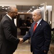 The British Foreign Secretary James Cleverly shakes hands with Israel's Prime Minister Benjamin Netanyahu