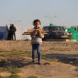 A child stands in a camp for displaced people in the southern Gaza city of Rafah