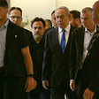 Israel's Prime Minister Benjamin Netanyahu surrounded by various other men
