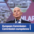 European Union Foreign Policy Chief Josep Borrell stands at a podium with the words European Commission written on it