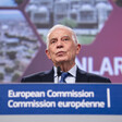 European Union Foreign Policy Chief Josep Borrell stands at a podium with the words European Commission written on it