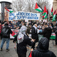 A banner reading One genocide does not justify another is held up at a demonstration in Berlin 