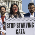 Congresswoman Rashida Tlaib speaks outside the US Capitol Building alongside medical professionals and Palestinian rights advocates and a sign reading "Stop starving Gaza"