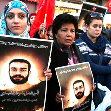 Shireen Issawi (left) at a Ramallah protest in support of her brother Samer