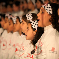 Close-up of girls singing