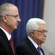 Close-up of profiles of Dr. Rami Hamdallah and Mahmoud Abbas