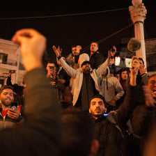 Demonstrators against a new Palestinian social security law chant slogans at Ramallah's central Manara Square