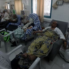 Patients receive dialysis treatment in a hospital room