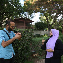 Man and woman communicate with sign language 