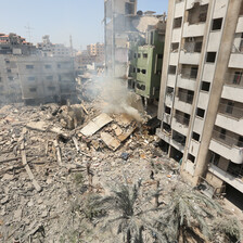 Rubble amid damaged and destroyed buildings 