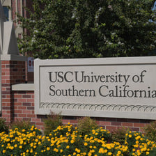 A sign in front of the USC campus