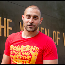 Man wearing red and yellow T-shirt 